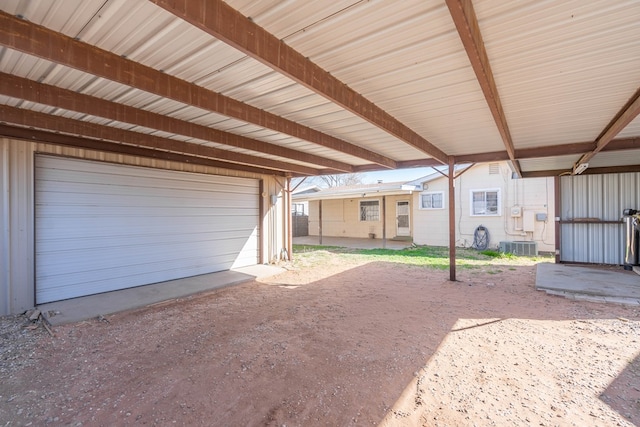 view of patio with a garage