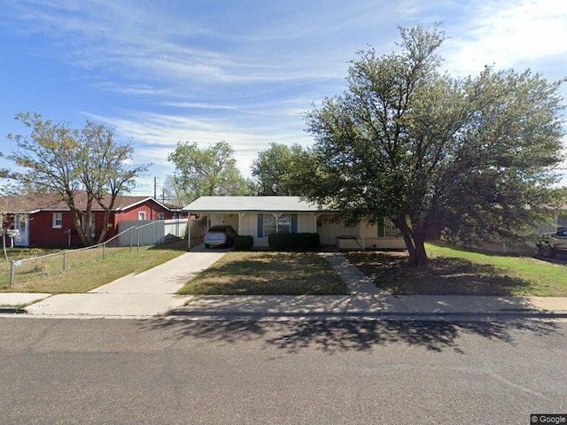 ranch-style house with a carport