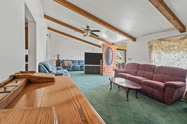 living room featuring a textured ceiling, vaulted ceiling with beams, carpet floors, and ceiling fan