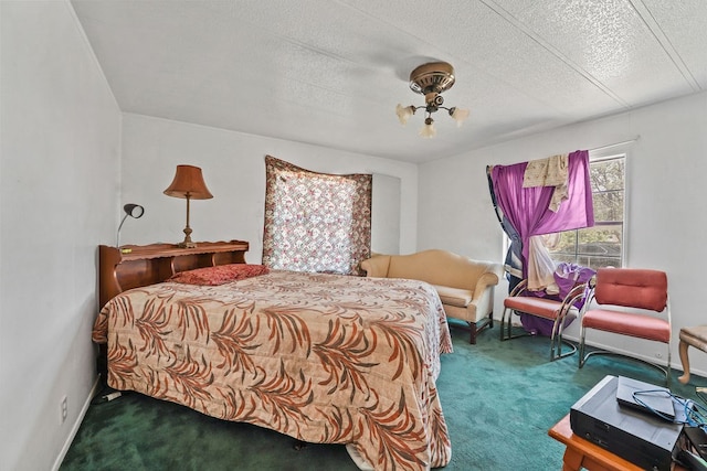 carpeted bedroom with a textured ceiling