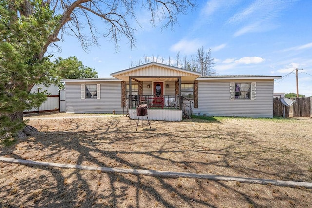 view of front of property featuring covered porch