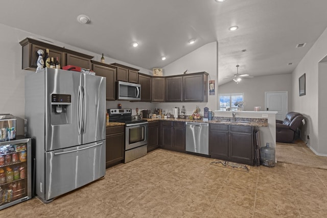 kitchen featuring lofted ceiling, wine cooler, ceiling fan, dark brown cabinets, and stainless steel appliances