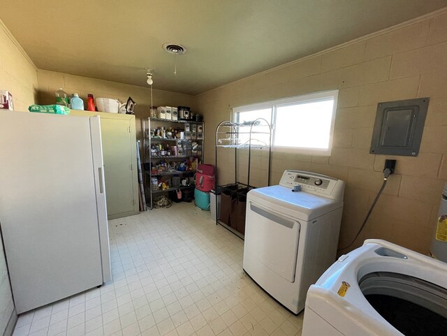 washroom with washer and dryer and electric panel