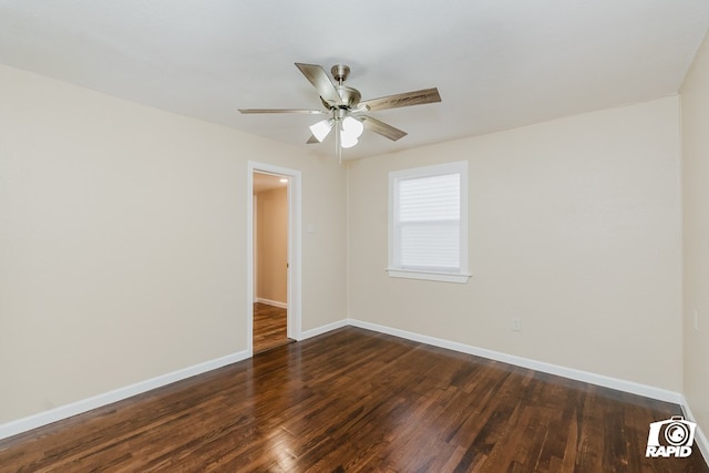 unfurnished room featuring ceiling fan and dark wood-type flooring