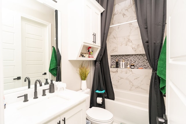 full bathroom with toilet, vanity, and shower / bath combo