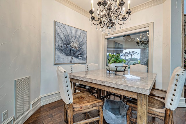 dining area with a chandelier, crown molding, and dark wood-type flooring