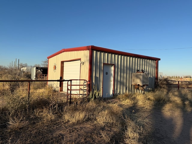 view of outdoor structure featuring a garage