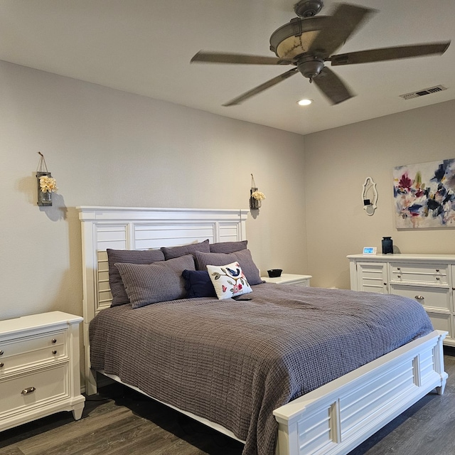 bedroom featuring dark wood-type flooring and ceiling fan