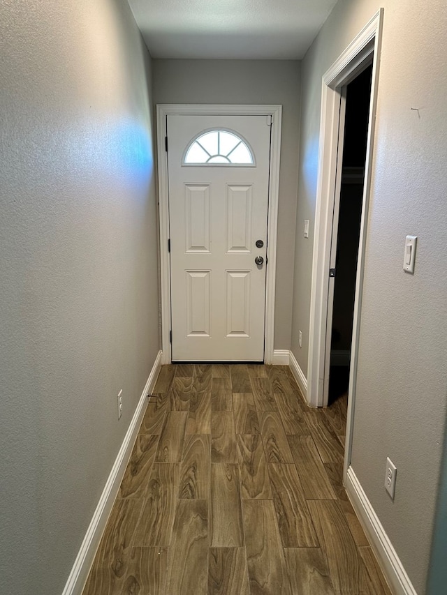 doorway featuring hardwood / wood-style floors