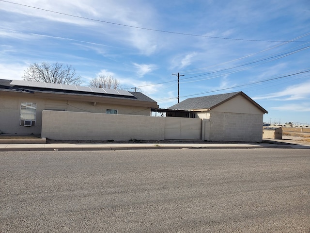 garage featuring solar panels