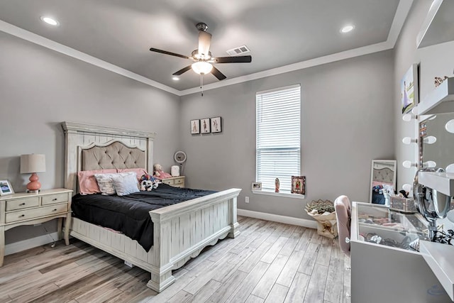 bedroom with crown molding, ceiling fan, and light hardwood / wood-style floors