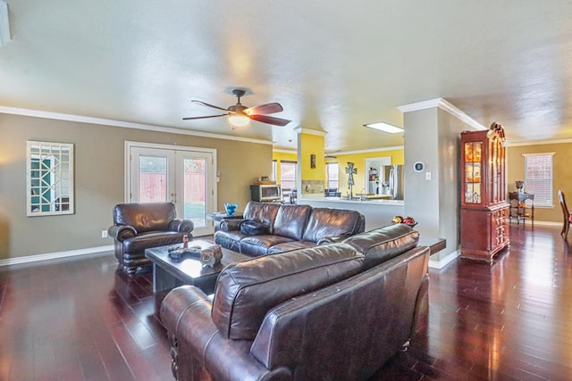 living room featuring french doors, dark hardwood / wood-style floors, ceiling fan, and ornamental molding