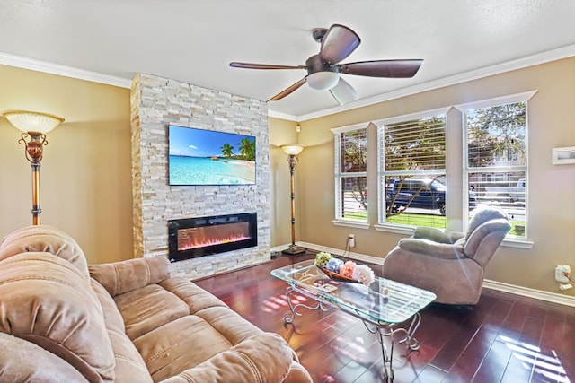 living room with a stone fireplace, plenty of natural light, ornamental molding, and hardwood / wood-style flooring