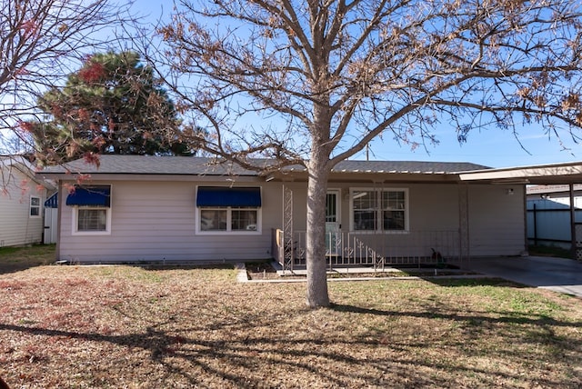 single story home with a carport