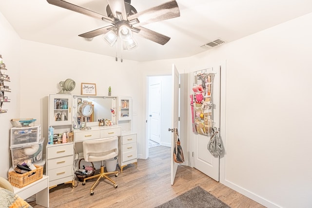 office area with ceiling fan and light wood-type flooring