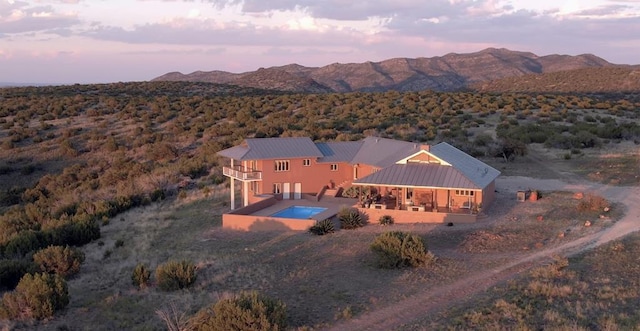 aerial view at dusk with a mountain view