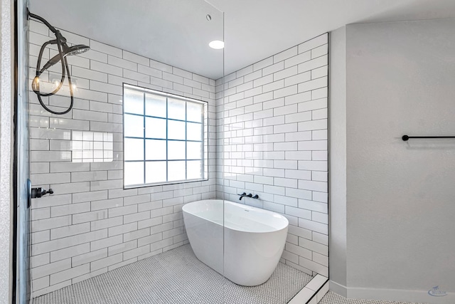 bathroom featuring tile patterned flooring and plus walk in shower