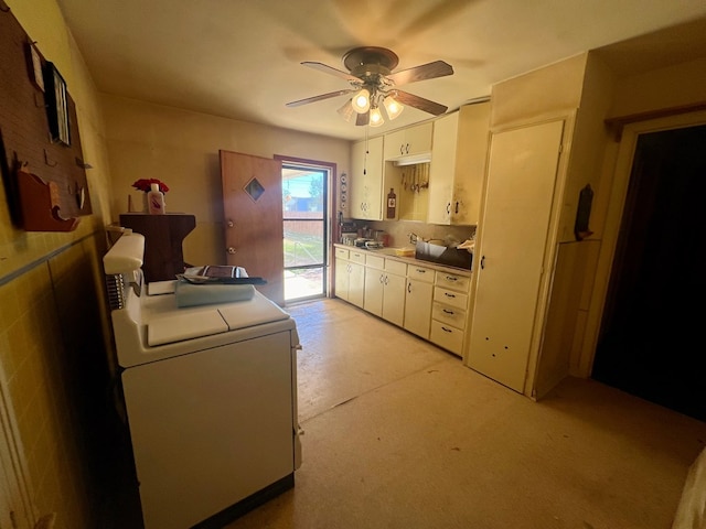 clothes washing area featuring washer / clothes dryer, ceiling fan, and sink