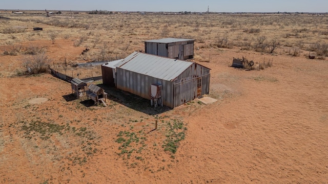 bird's eye view featuring a rural view and a desert view