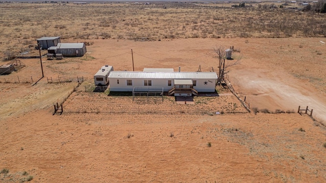 bird's eye view featuring a rural view and view of desert