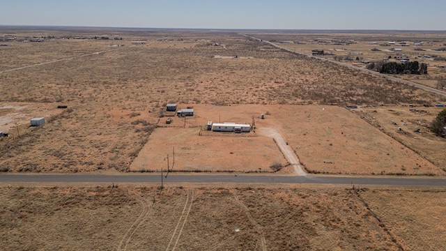 drone / aerial view with a rural view and a desert view