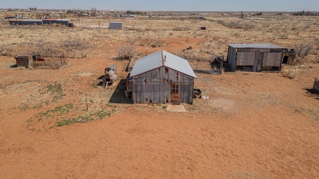 bird's eye view with a desert view