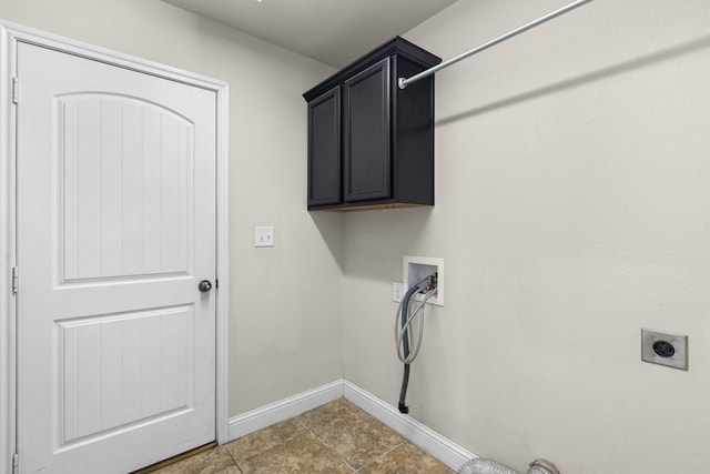 laundry room with cabinet space, hookup for a washing machine, hookup for an electric dryer, and baseboards