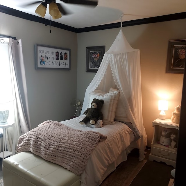 bedroom featuring ornamental molding and ceiling fan