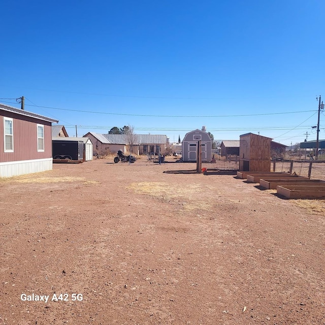 view of yard with a shed