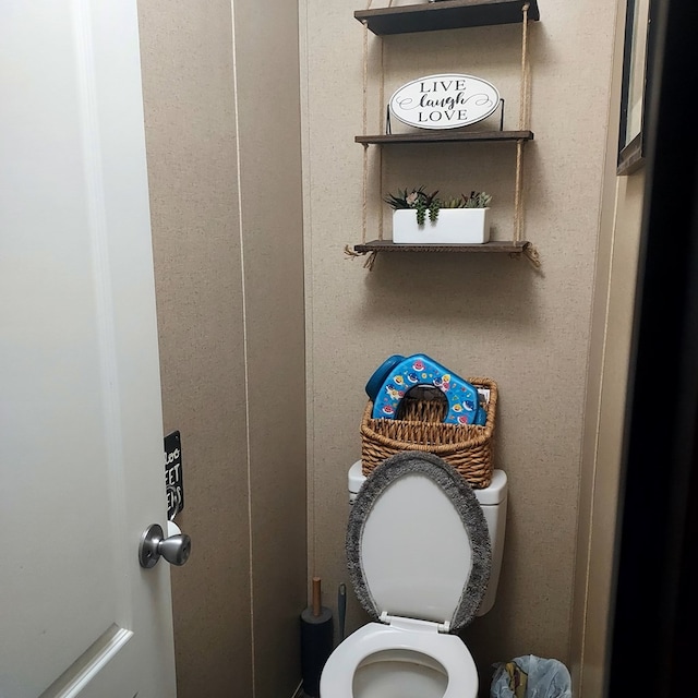 bathroom featuring toilet