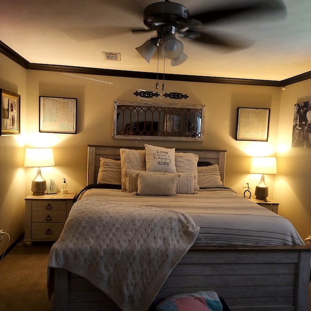 bedroom featuring ornamental molding, ceiling fan, and dark colored carpet