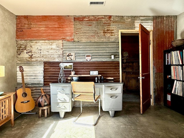 office space featuring concrete floors