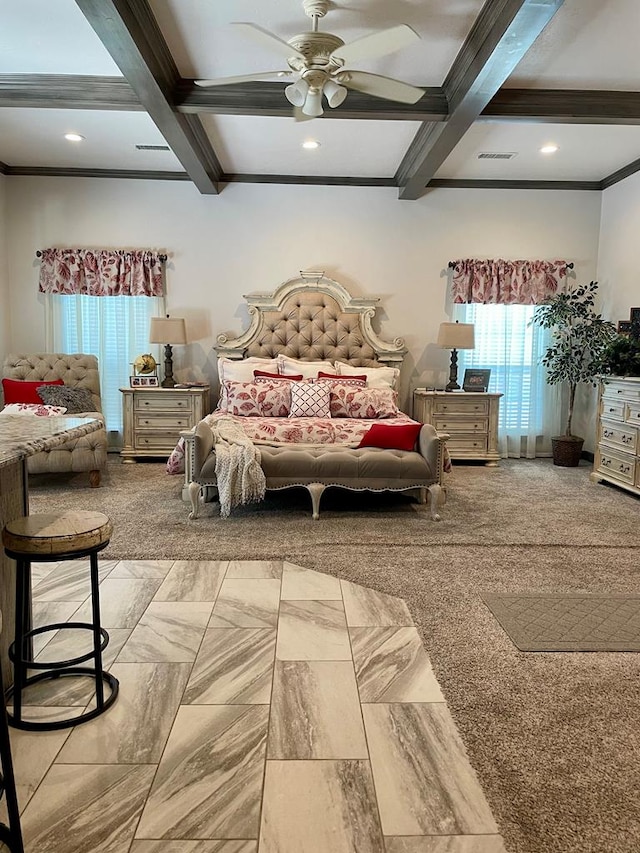 bedroom featuring ceiling fan, beam ceiling, crown molding, and coffered ceiling