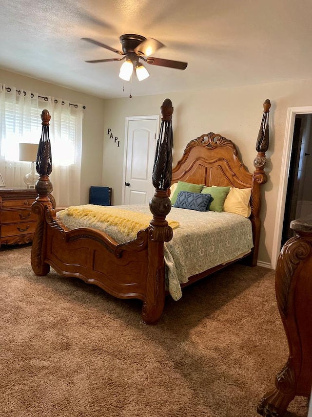 bedroom featuring carpet and ceiling fan