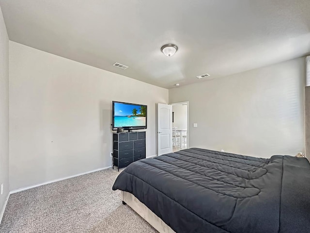 bedroom featuring carpet, visible vents, and baseboards