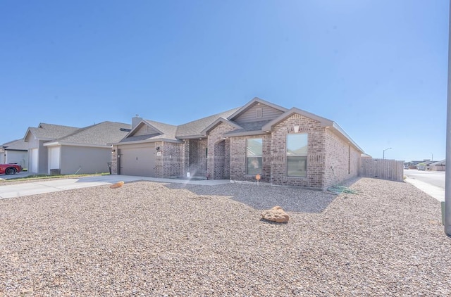 view of front of property featuring a garage