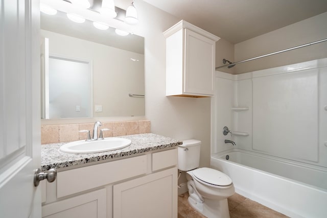 full bathroom with vanity, bathtub / shower combination, and toilet