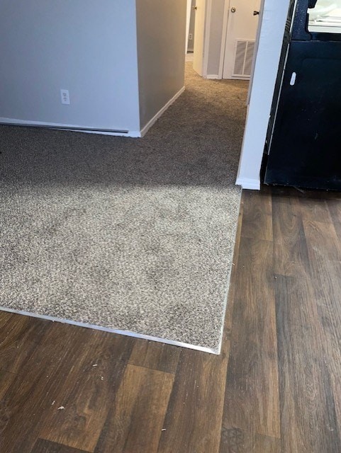 interior details featuring wood-type flooring