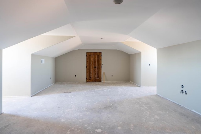 bonus room with vaulted ceiling