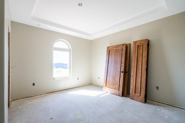 interior space featuring a raised ceiling