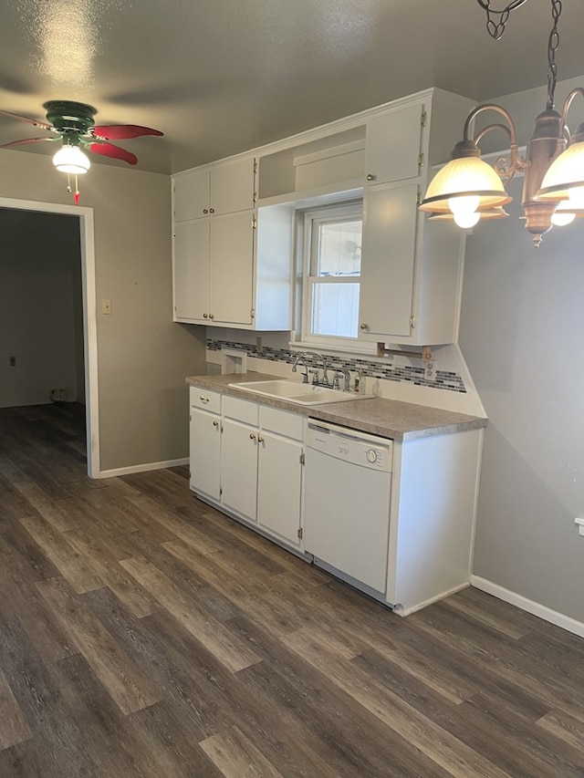 kitchen with white cabinetry, dishwasher, and sink