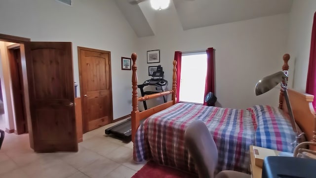 bedroom featuring ceiling fan and lofted ceiling