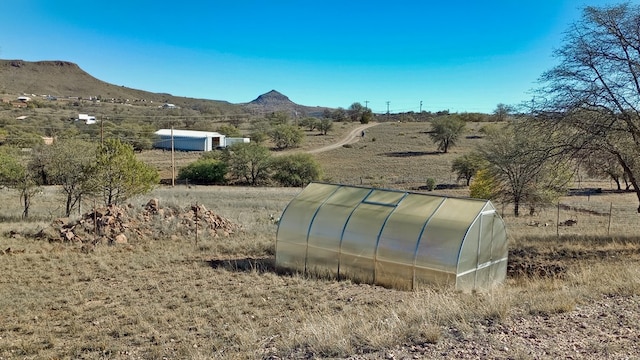 exterior space with a rural view