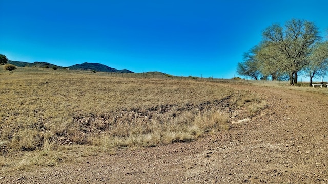 view of mountain feature featuring a rural view