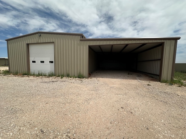 view of outdoor structure with a garage