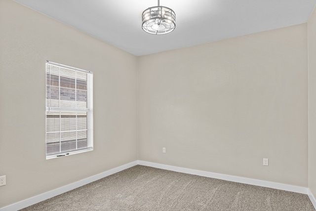 empty room with carpet flooring