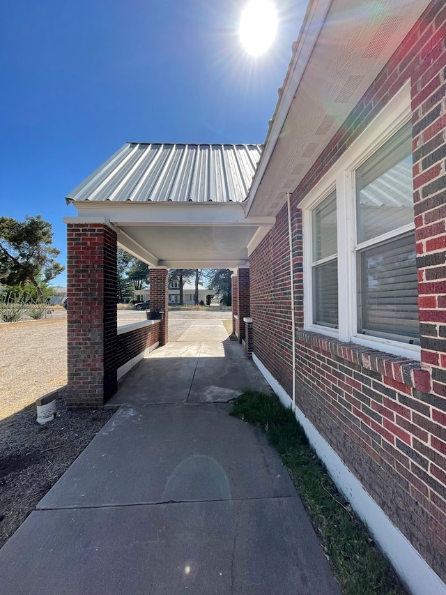 view of patio featuring a carport