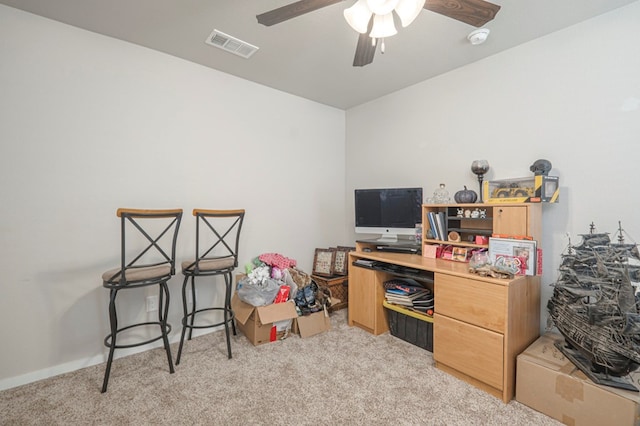 recreation room with a ceiling fan, visible vents, and light carpet