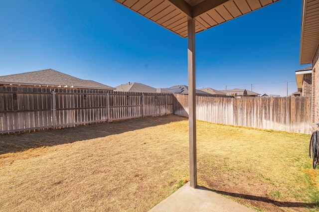 view of yard featuring a fenced backyard