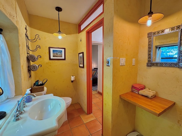 bathroom featuring tile patterned floors and sink